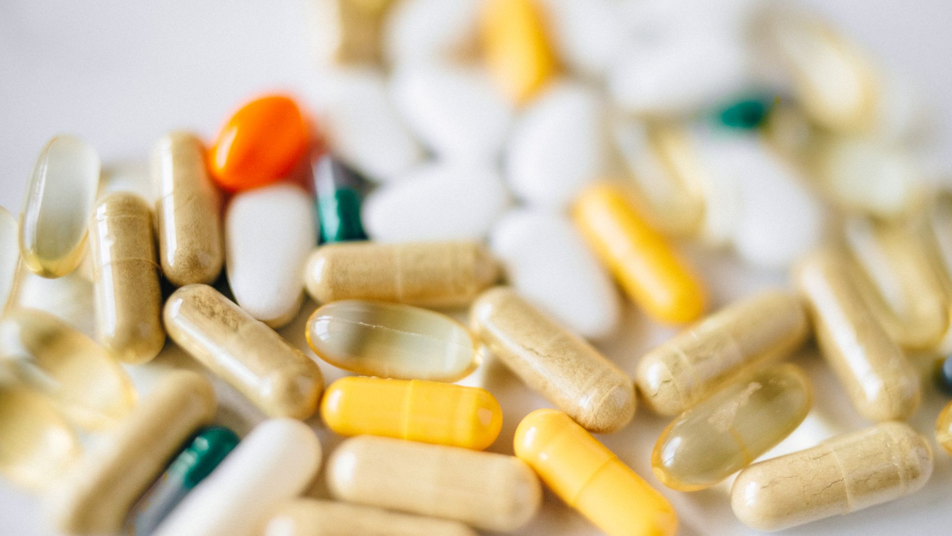 Idiopathic Hypersomnia Medication: Exploring Treatment Options A close-up image of various pills and capsules showcasing diverse colors and types of pharmaceuticals — idiopathic hypersomnia medication