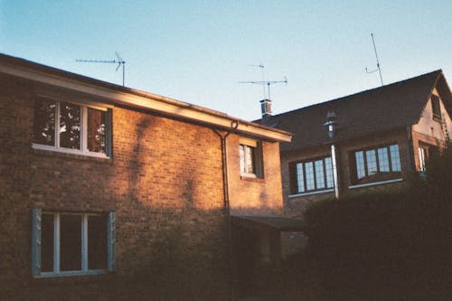 Free Houses with Antennas on Roof Stock Photo