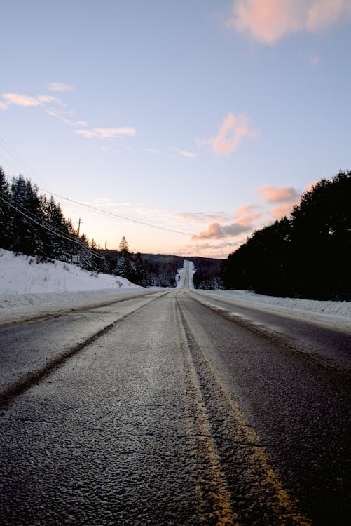 Empty asphalt road on winter day
