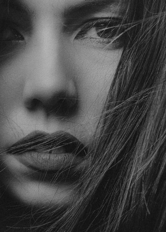 Grayscale Photo of a Woman's Face · Free Stock Photo