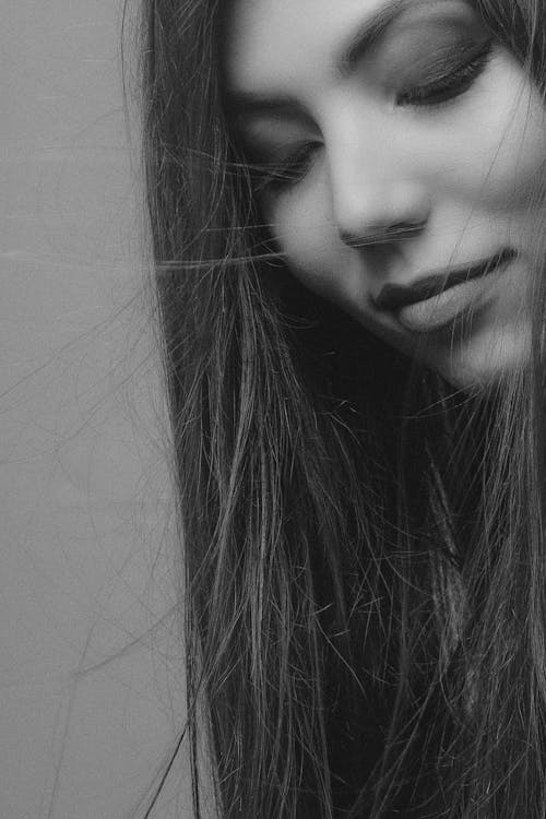 Free Grayscale Photo of a Woman with Long Hair Stock Photo