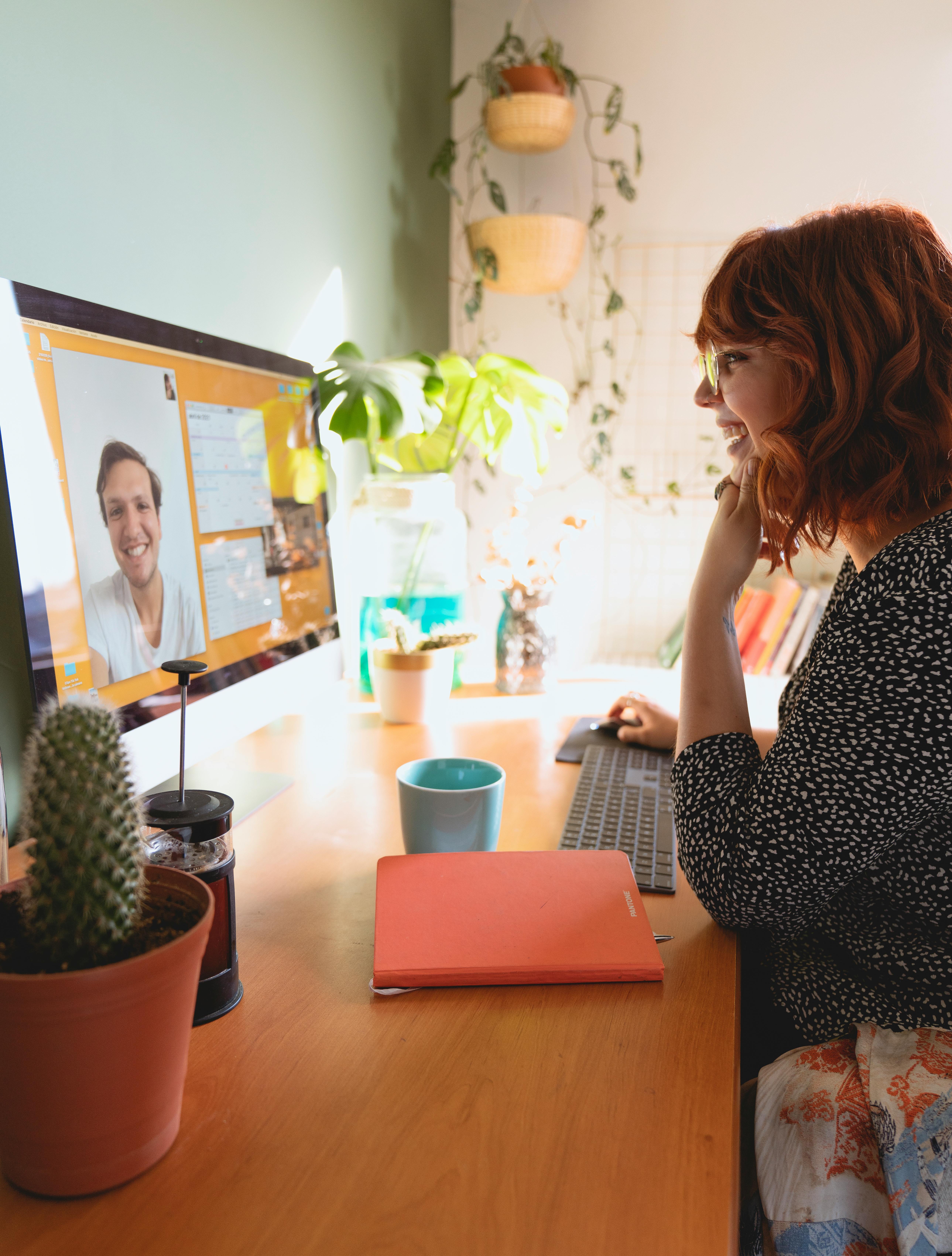 woman having a video call with a man