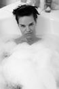 Woman in White Bathtub With Water