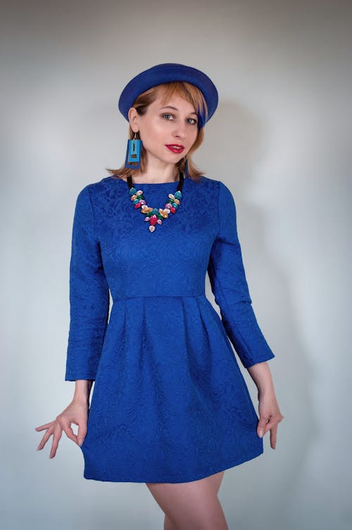 Elegant woman in blue clothes