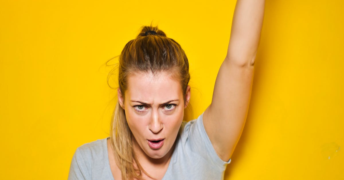 Photo of a Woman Holding an Ipad