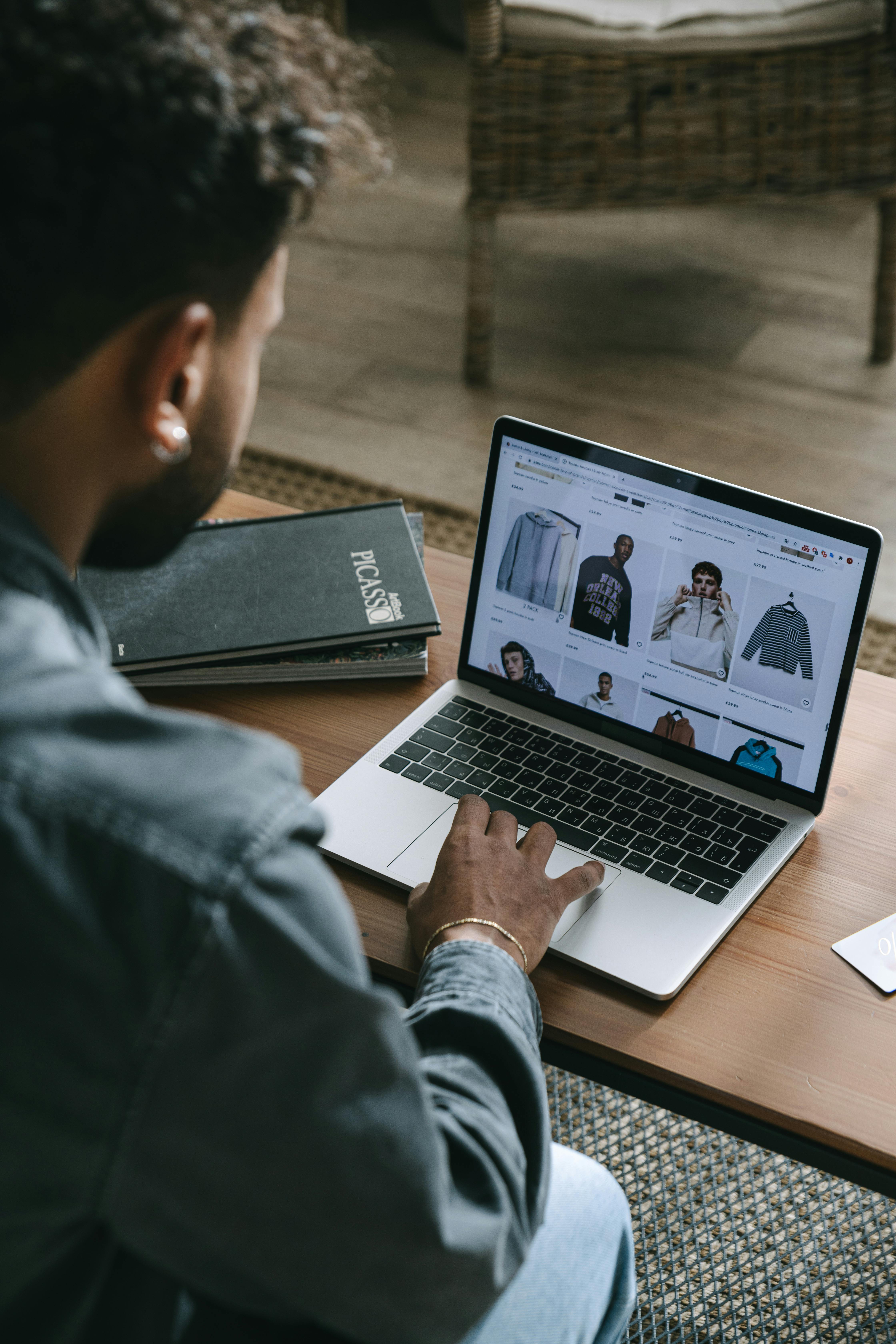 a man using his laptop