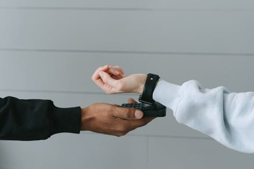 Free Person Paying Using Her Smartwatch Stock Photo