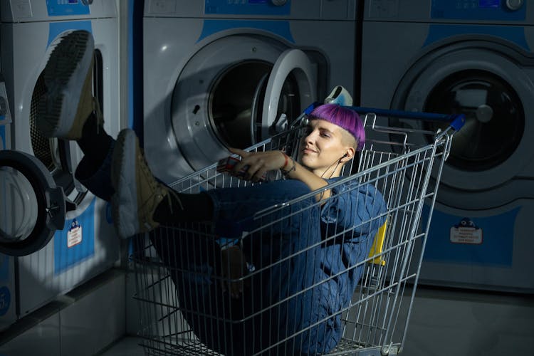 Woman In A Shopping Cart