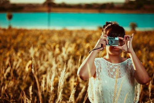 A Woman Using a Camera