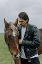 Free stock photo of adult, animal, black leather jacket