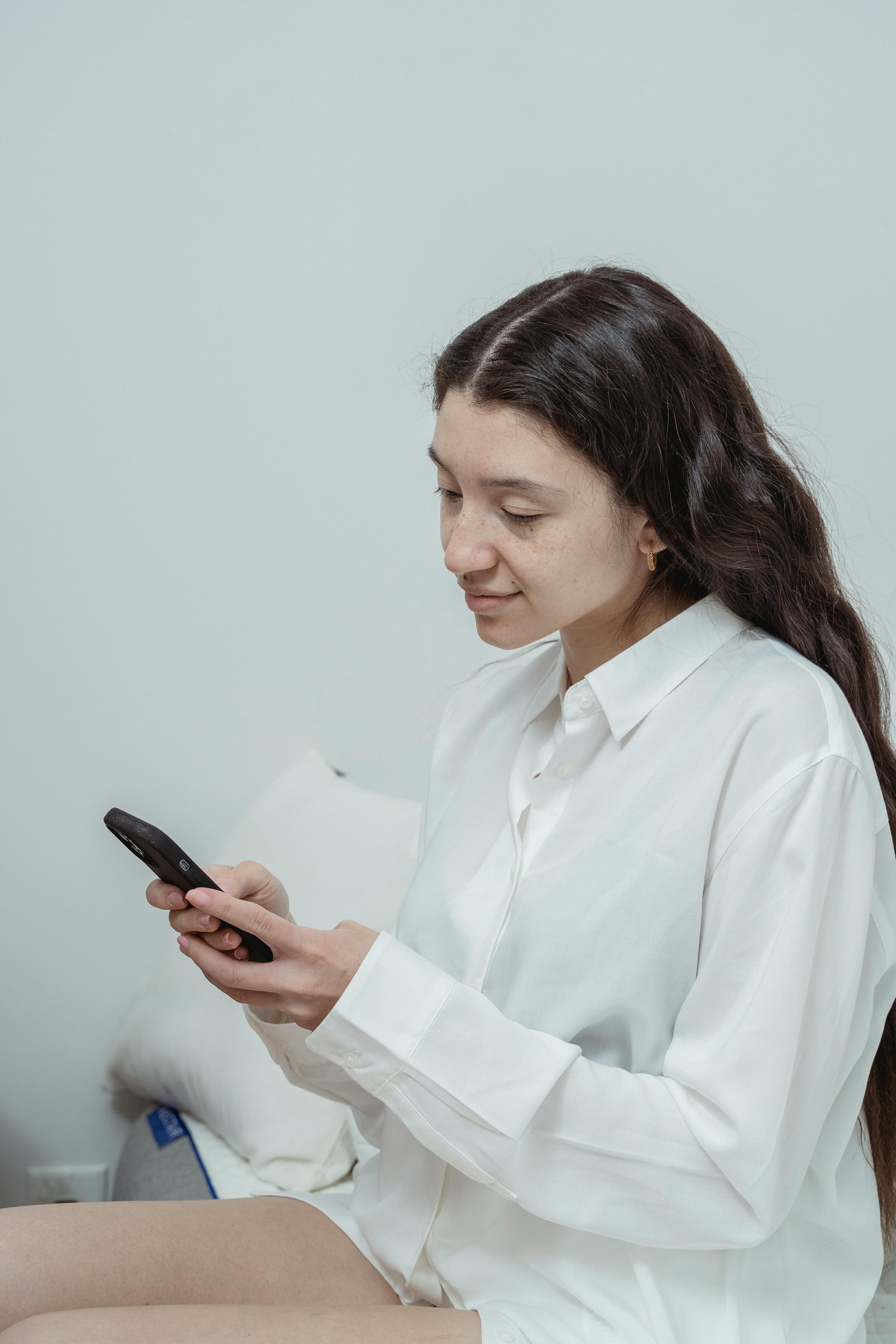 portrait of a woman using a smart phone