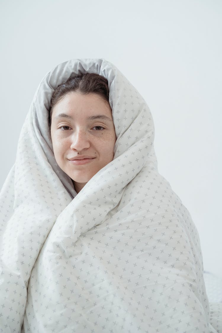 Portrait Of Woman Wrapped In Blanket