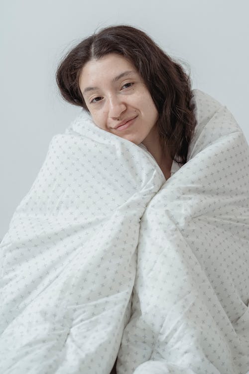 Free Pretty Woman Wrapped with a Blanket Stock Photo