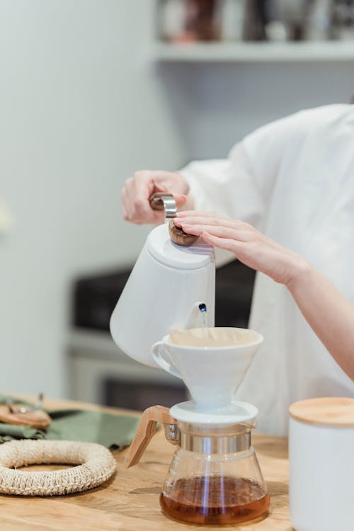 Female Hands Making Tea