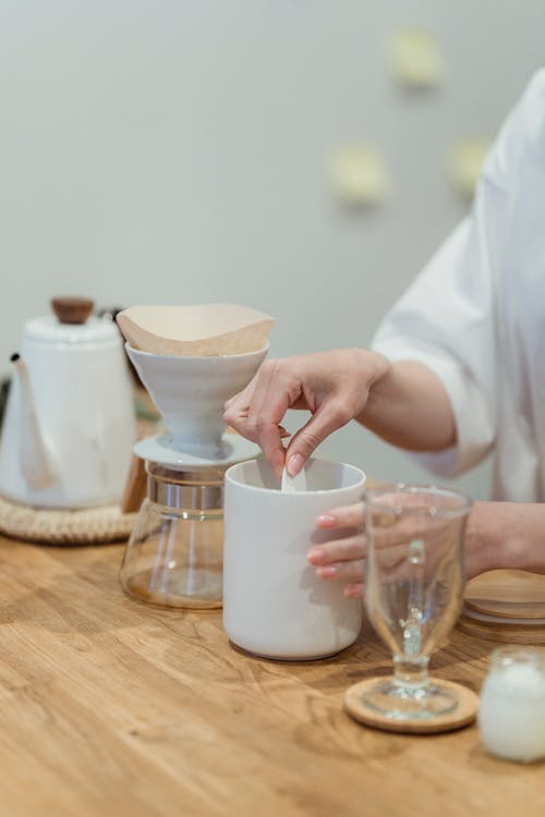 Person Making A Brewed Coffee