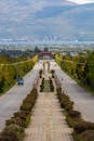 Symmetrical View of Monument in a Park and Hills in Background