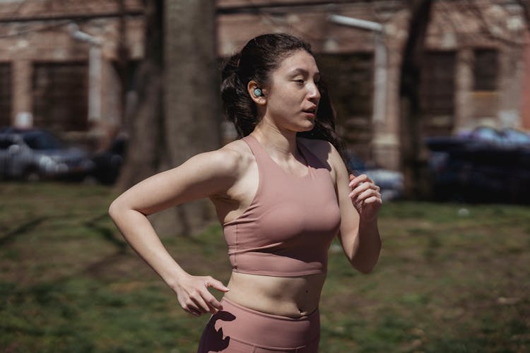 Woman Jogging In City