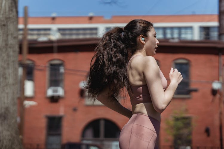 Woman Jogging In City