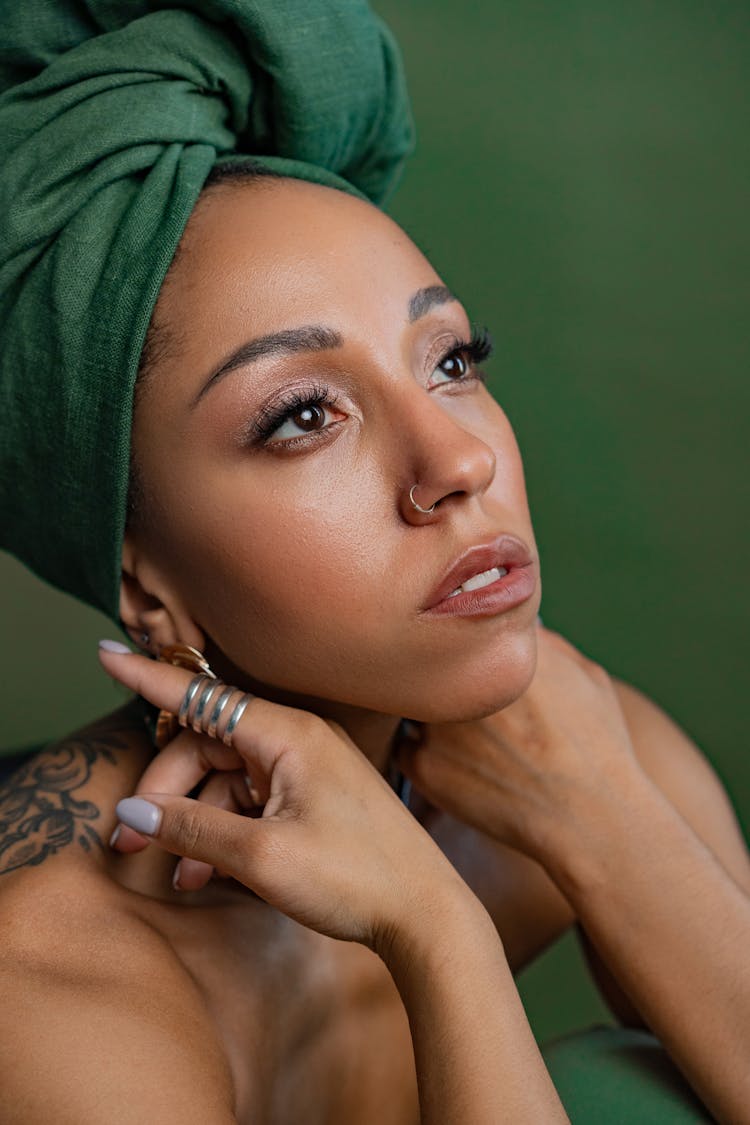A Woman With Green Head Wrap 