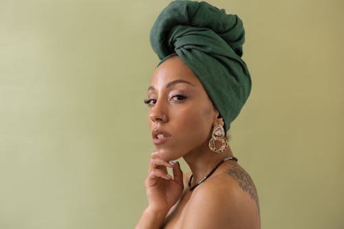 Woman Wearing a Green Head Wrap