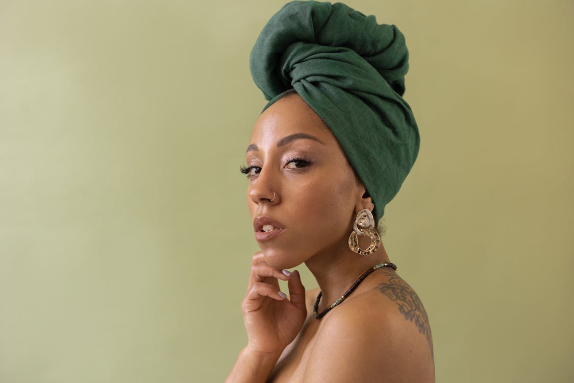 Woman Wearing a Green Head Wrap