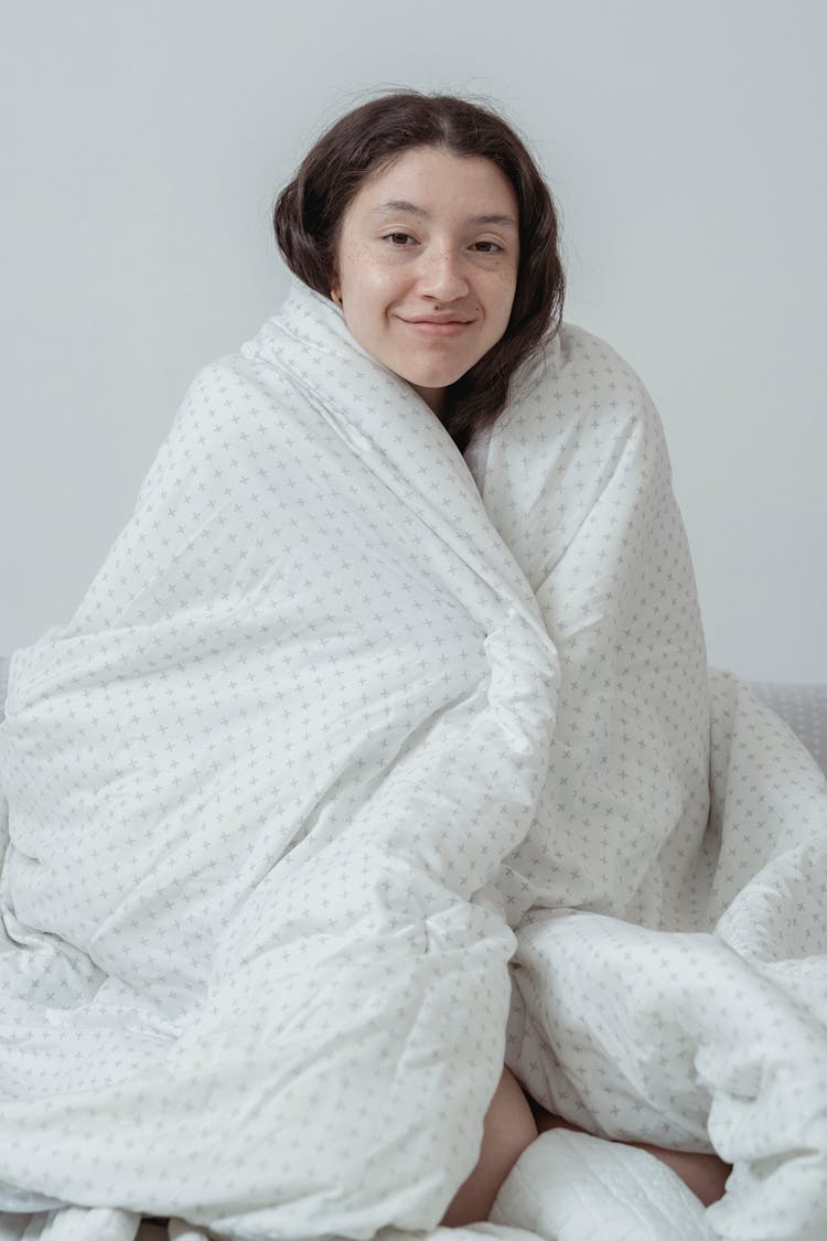 A Woman Wrapped In Blanket