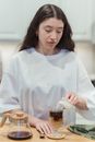A Woman Making Coffee