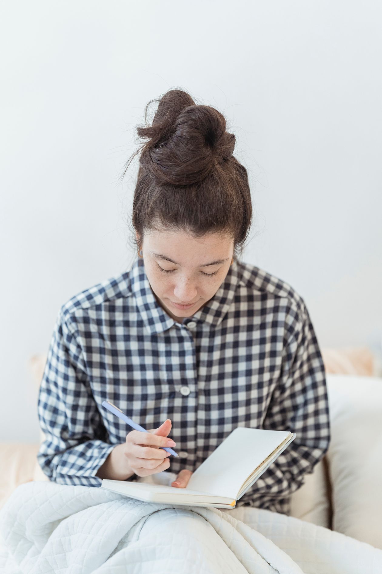 open notebook with a cup of coffee for morning journaling