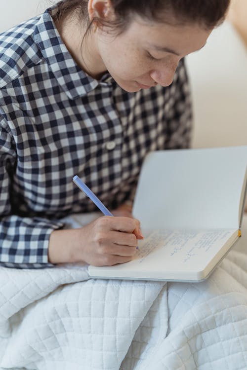 A Woman in Plaid Shirt