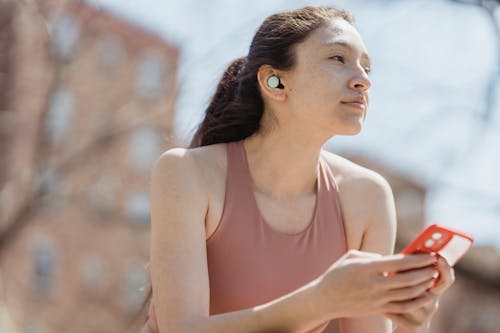 Woman Holding a Smartphone