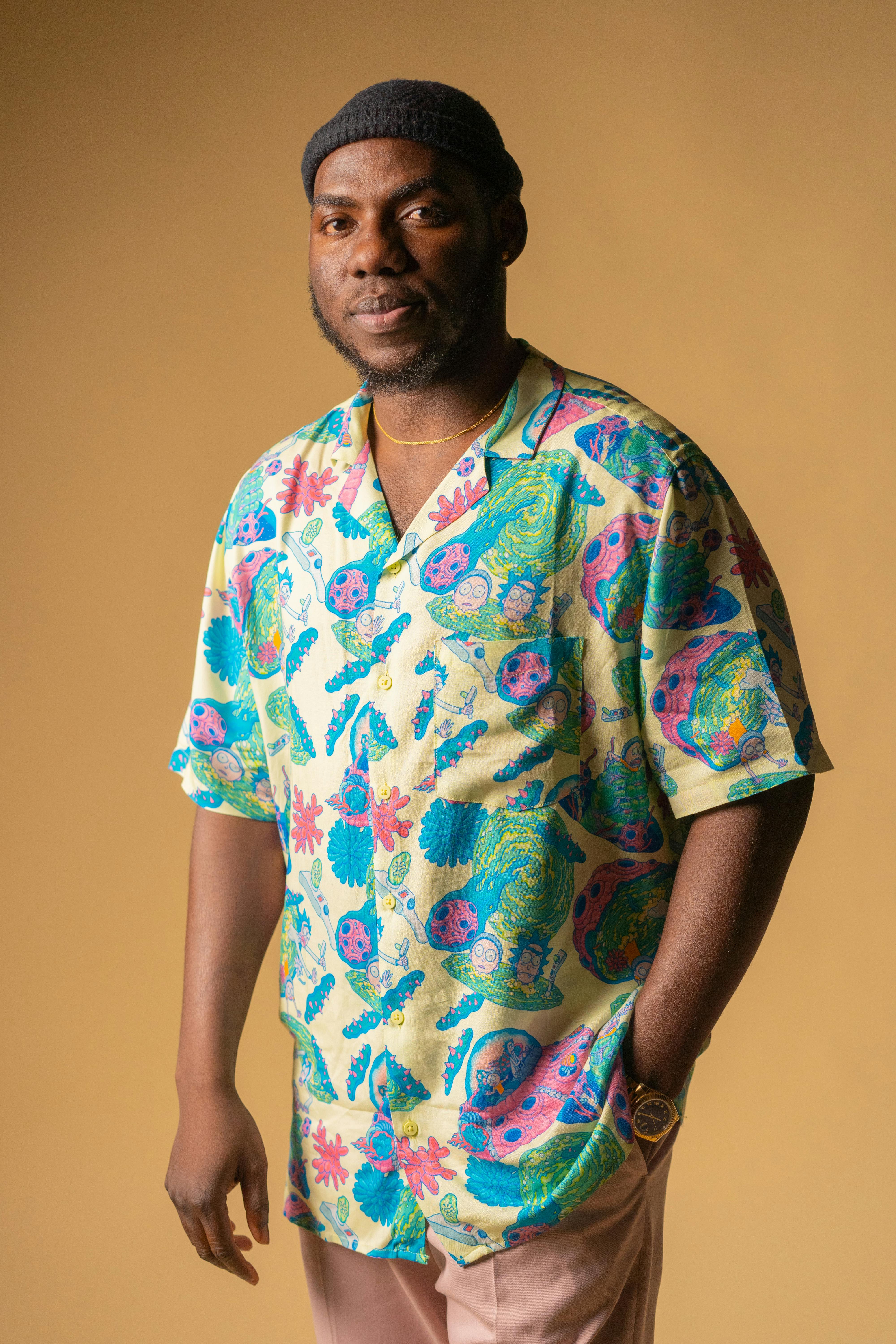 A Man on Black Shirt and Pants Wearing a Hat · Free Stock Photo