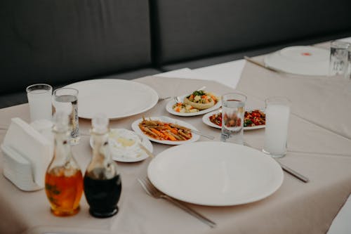 Free Served table with dishware in restaurant Stock Photo