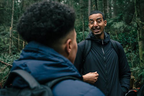 Two Men Talking to Each Other