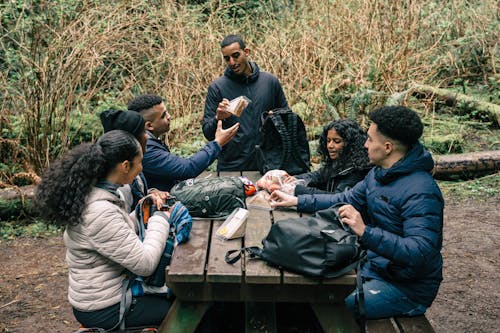 Friends Sharing Snacks to Each Other