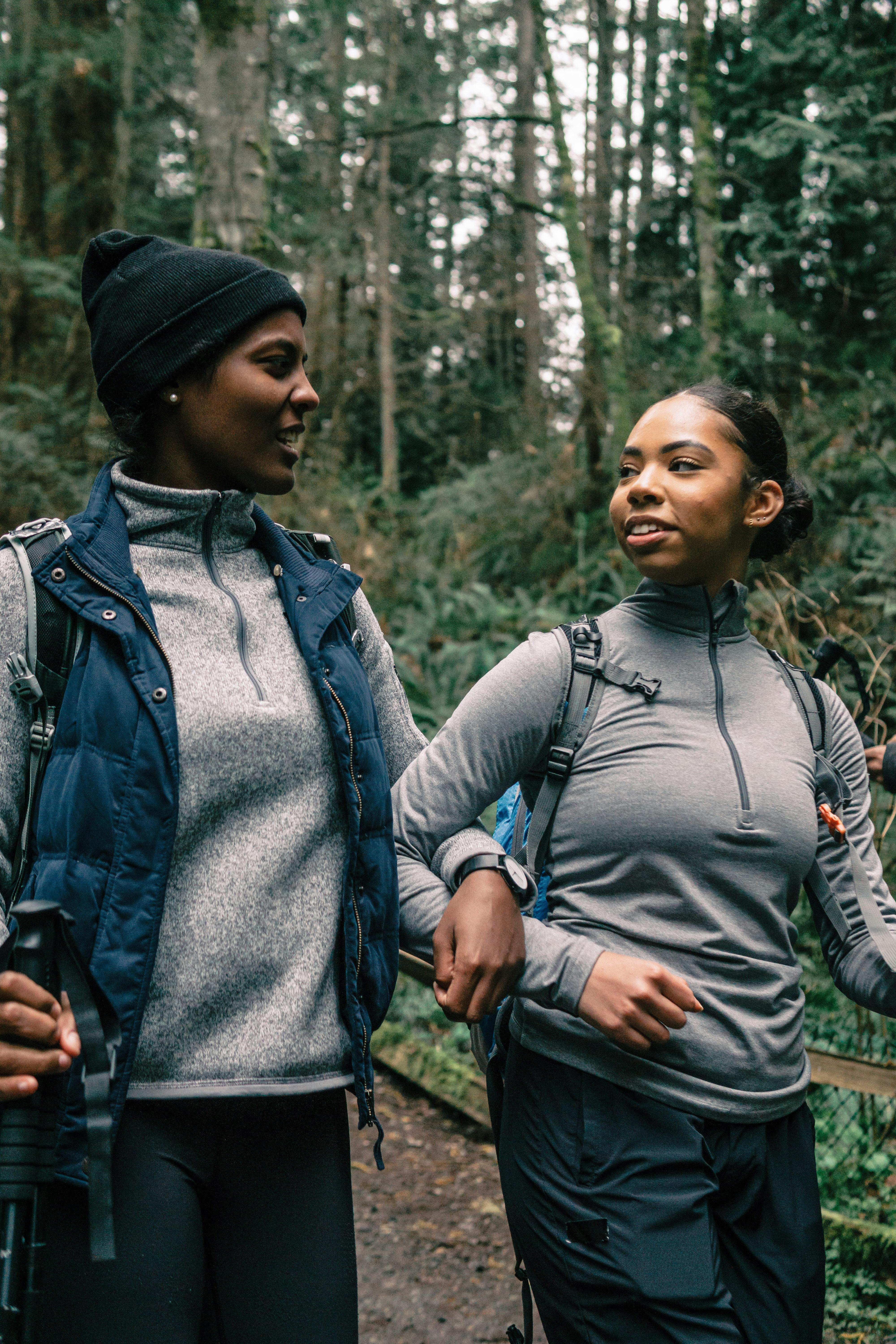 women hiking in a forest