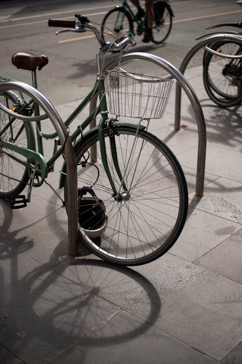 A Bicycle Locked In A Bicycle Parking