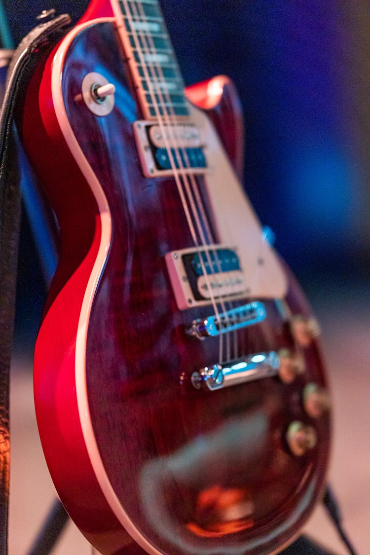 Electric Guitar On Stage In Concert Hall