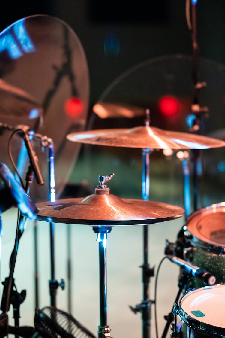 Drum Kit With Cymbals On Stage In Evening