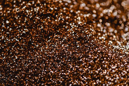 Gold Glitter in Close-Up Photography