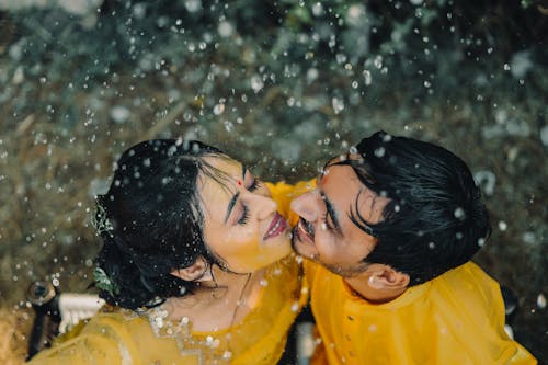 A Wet Couple Kissing