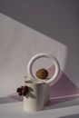 White Round Frame With Red Flower on White Table
