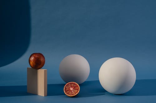 Free Blood Oranges Near Geometric Shapes Objects Stock Photo
