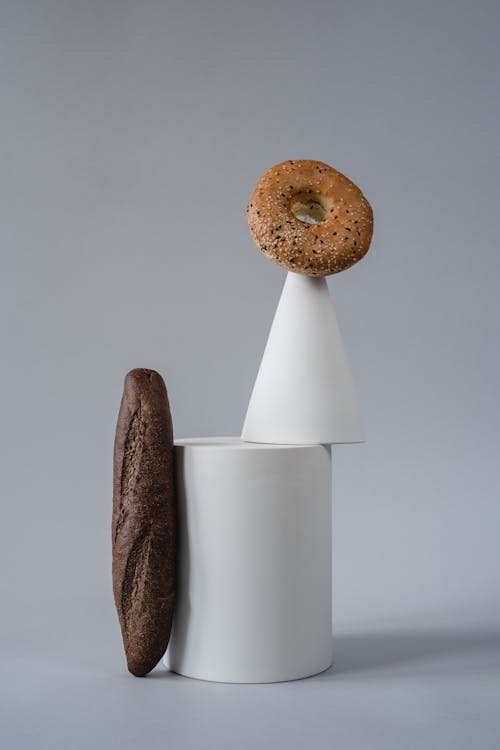 Bagel and Bread on Gray Background 