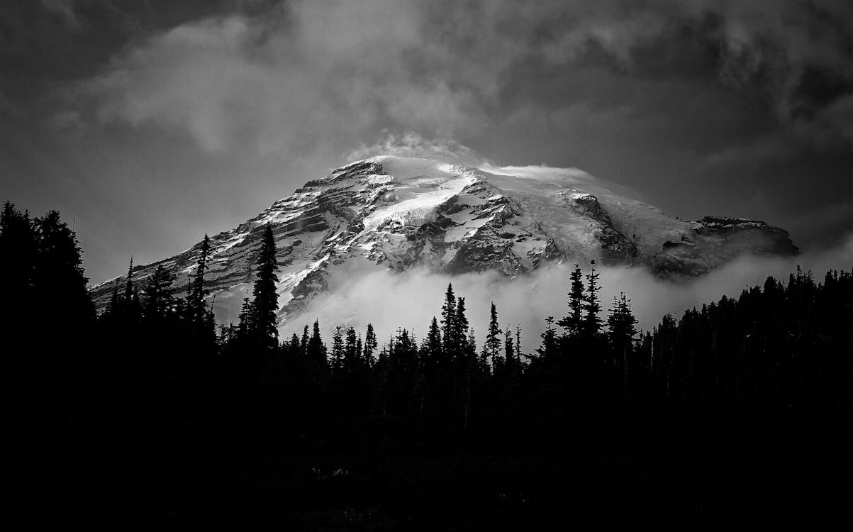 Free Grayscale Photo Of A Mountain Covered With Snow Stock Photo