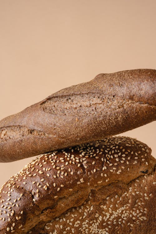 Free A Baguette over a Loaf of Bread Stock Photo