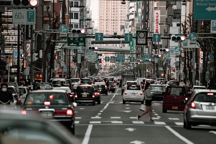 A Busy Road In A City In Japan