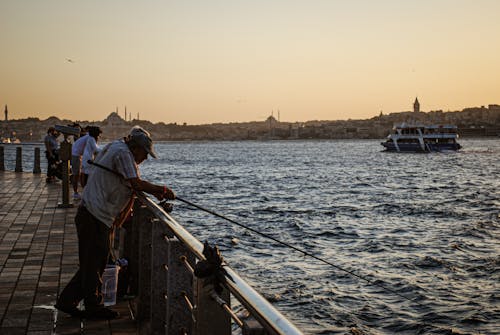 Free stock photo of coast, fisherman, street photography