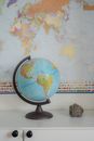 World Map, Globe and Rock