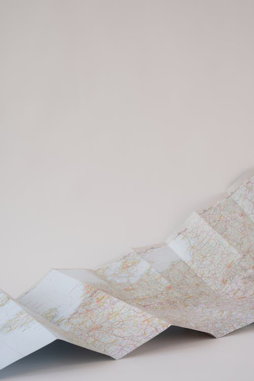 Free Paper Map on the White Surface Stock Photo