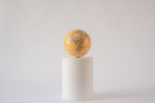 Yellow Globe on a Tube Stand